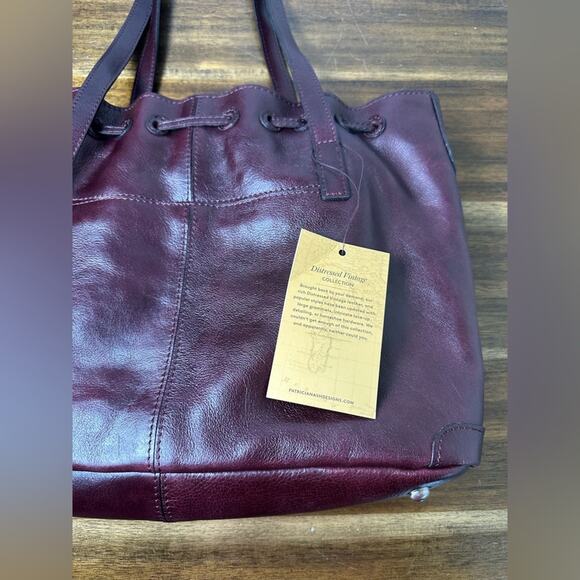 NWT Patricia Nash 10th Anniversary Plum Soft Leather Drawstring Witney Tote - Picture 4 of 9